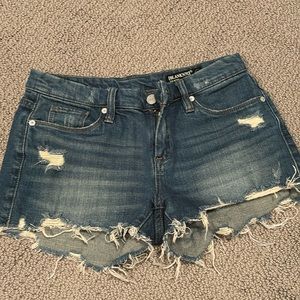 dark wash ripped jean shorts